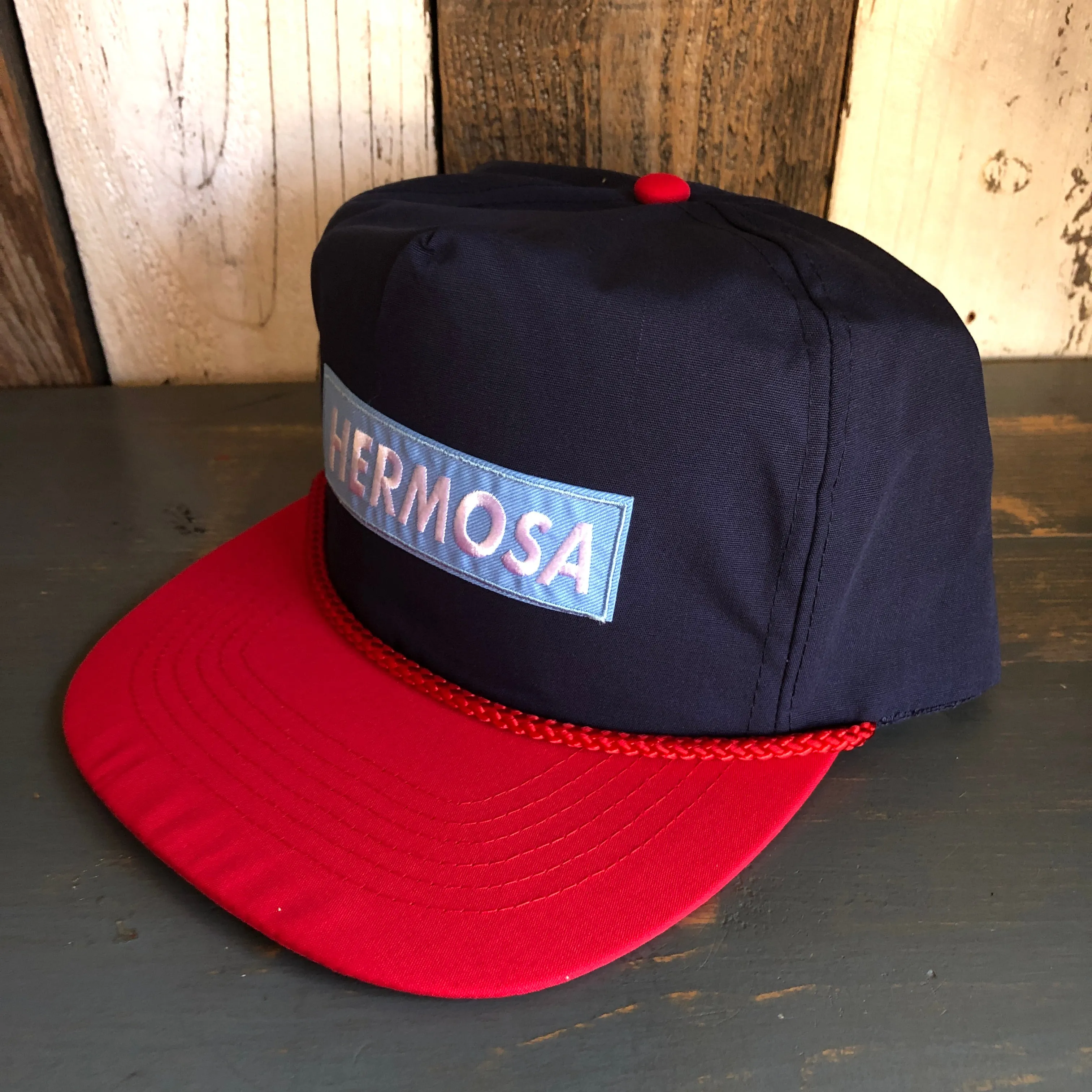 Hermosa Beach BLUE SUPREME HERMOSA 5 Panel High Crown Baseball Cap - Navy Blue/Red