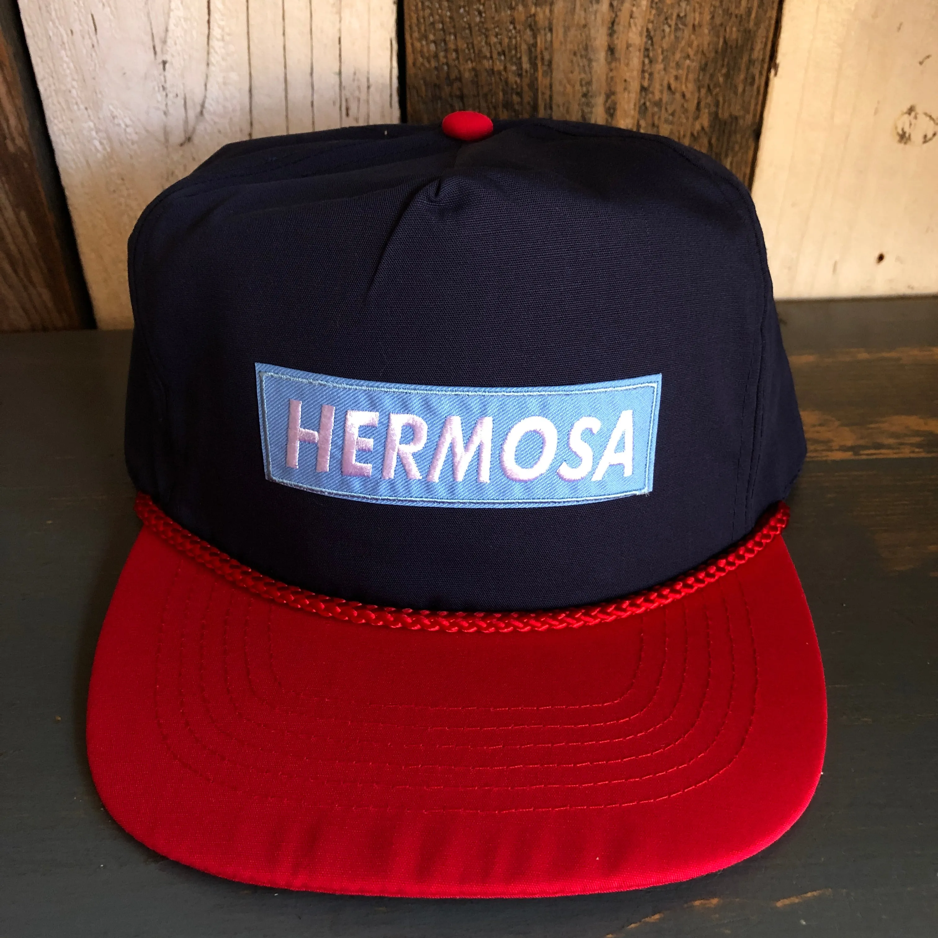 Hermosa Beach BLUE SUPREME HERMOSA 5 Panel High Crown Baseball Cap - Navy Blue/Red
