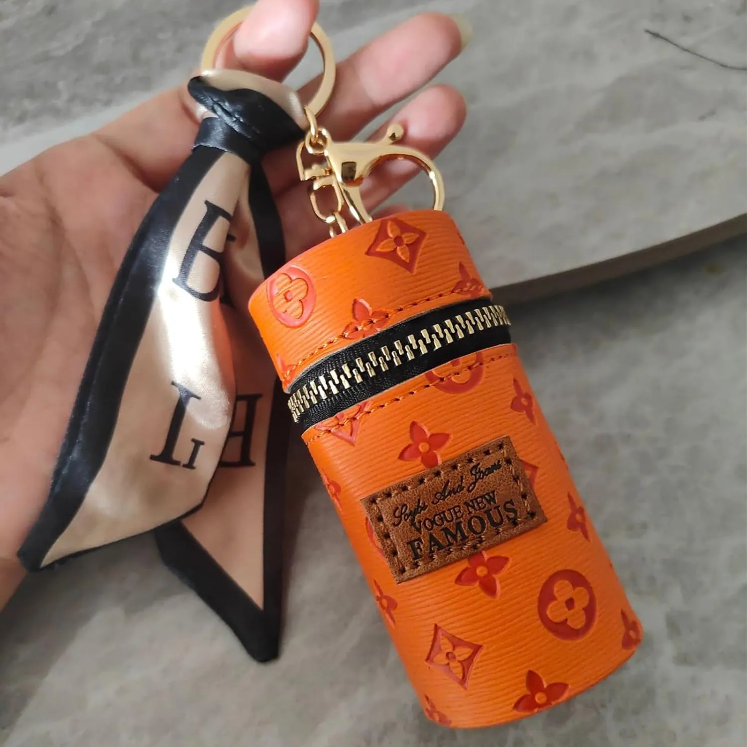 Mini Bucket Bag for Lipsticks - Portable Embossed Makeup Pouch with Drawstring, Cute Keychain Coin Purse for Women, Travel Cosmetic Organizer (Orange)
