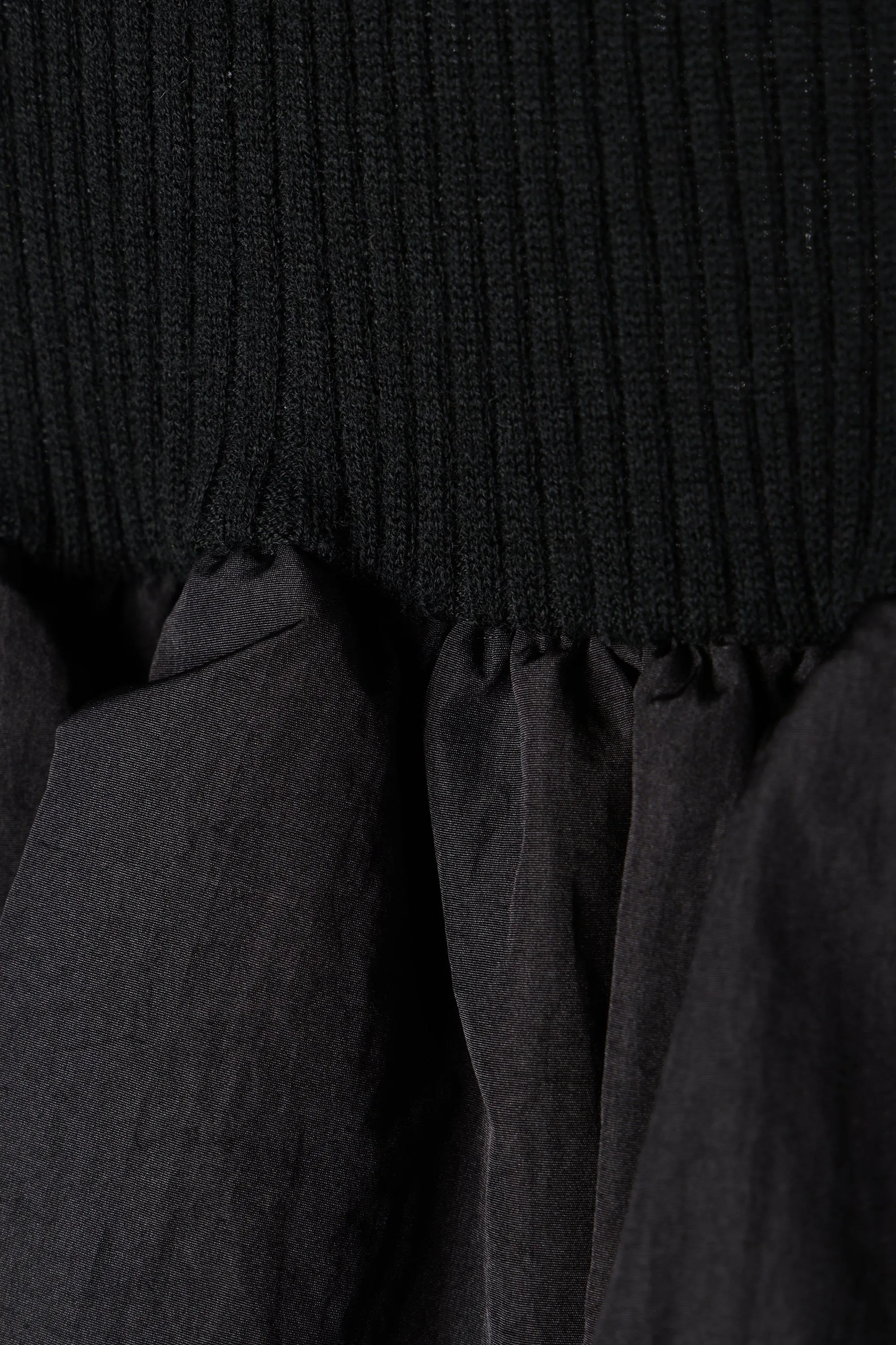 peplum docking knit