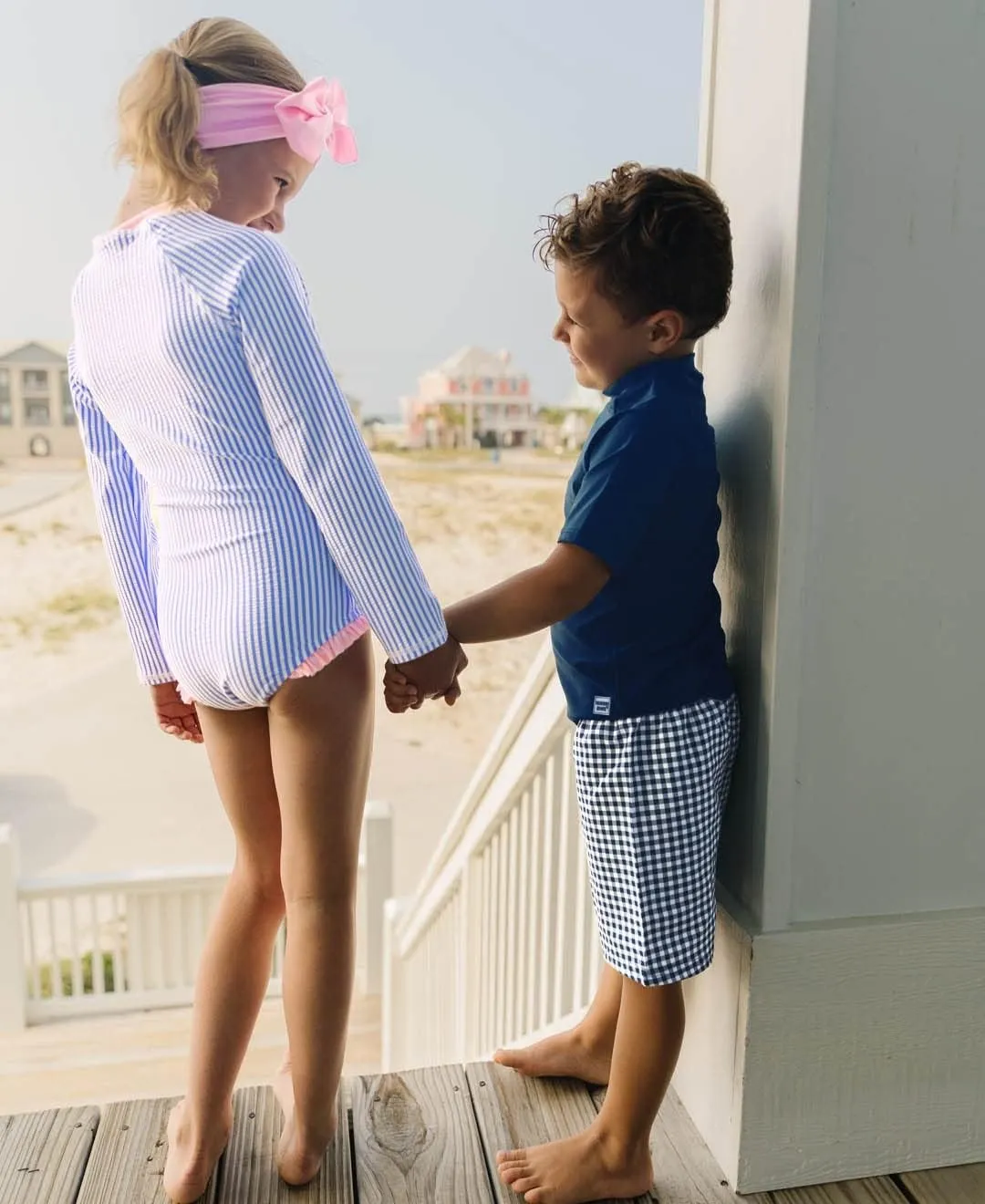 RuffleButts Girls One Piece Rash Guard Baby Swimsuit UPF 50  Sun Protection